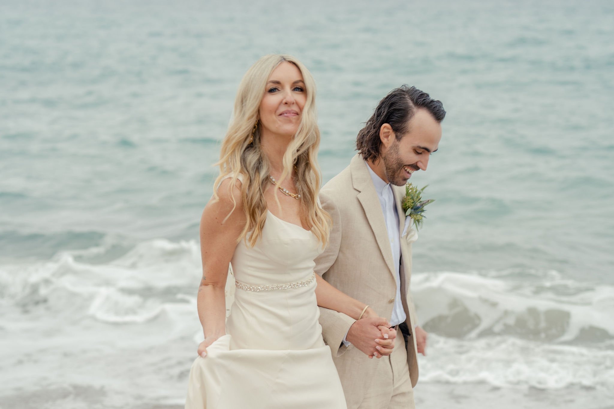 founder, podcast host, and manifestation coach plans wedding ceremony along the cliffs of point dume beach in california