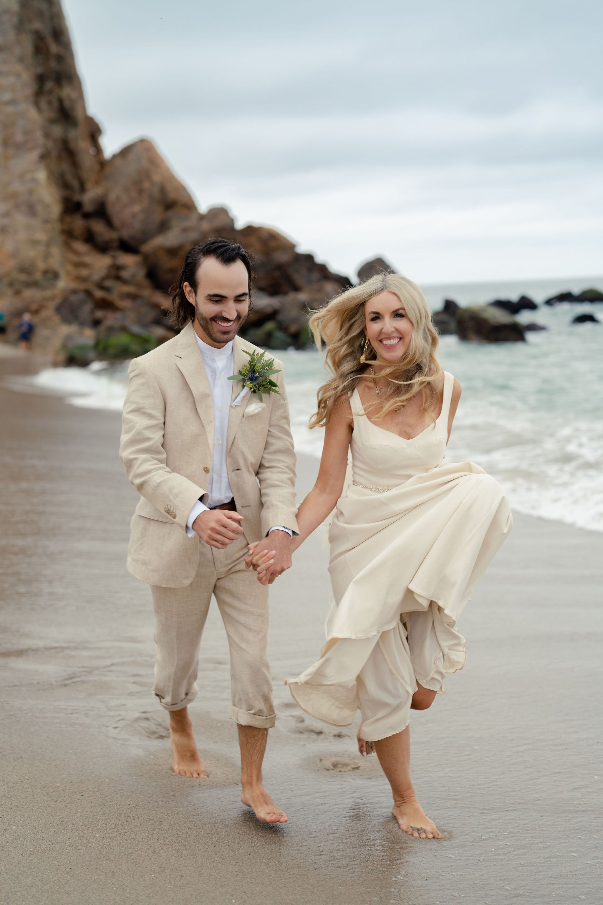 founder, podcast host, and manifestation coach plans wedding ceremony along the cliffs of point dume beach in malibu