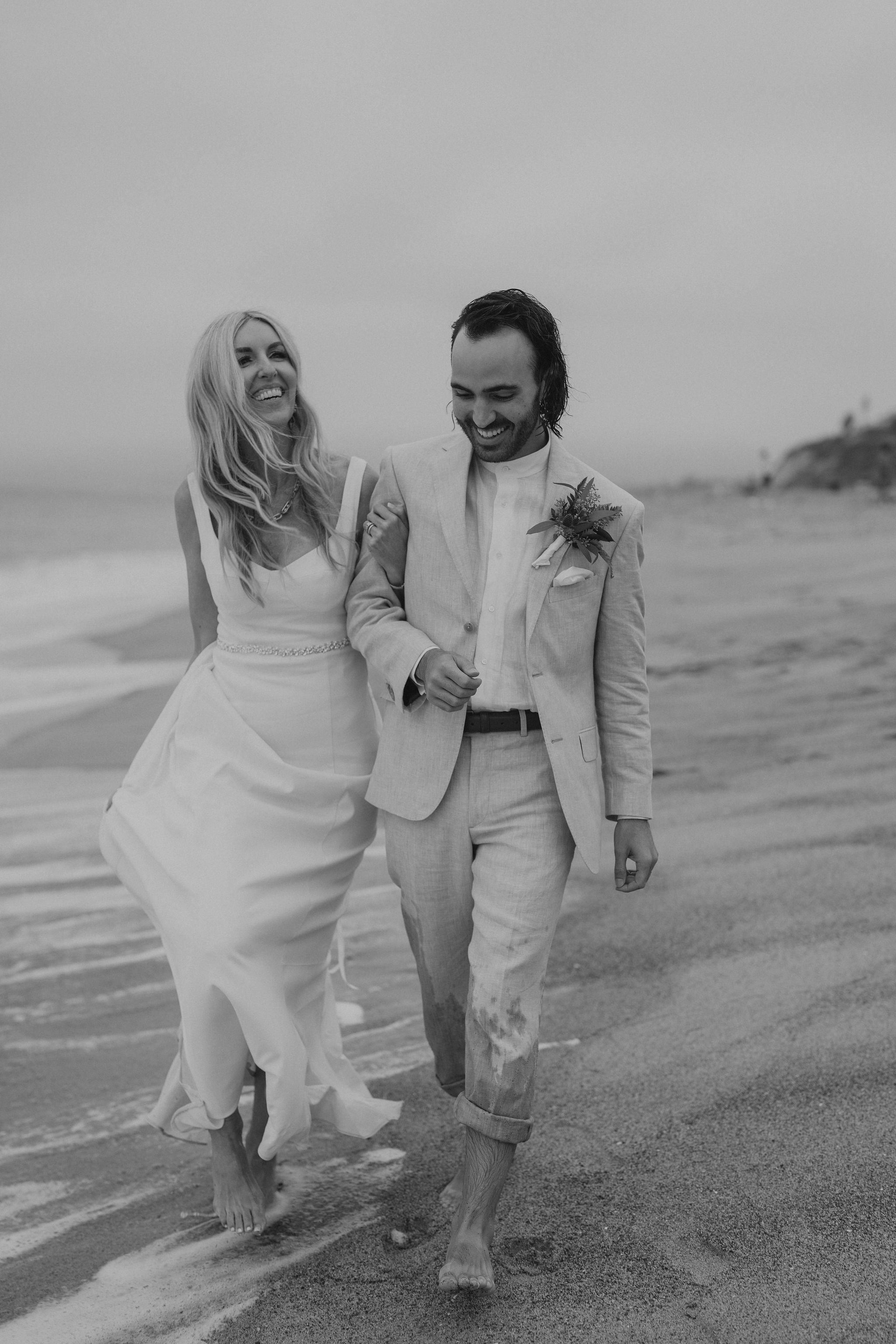 founder, podcast host, and manifestation coach plans wedding ceremony along the cliffs of point dume beach in malibu, CA
