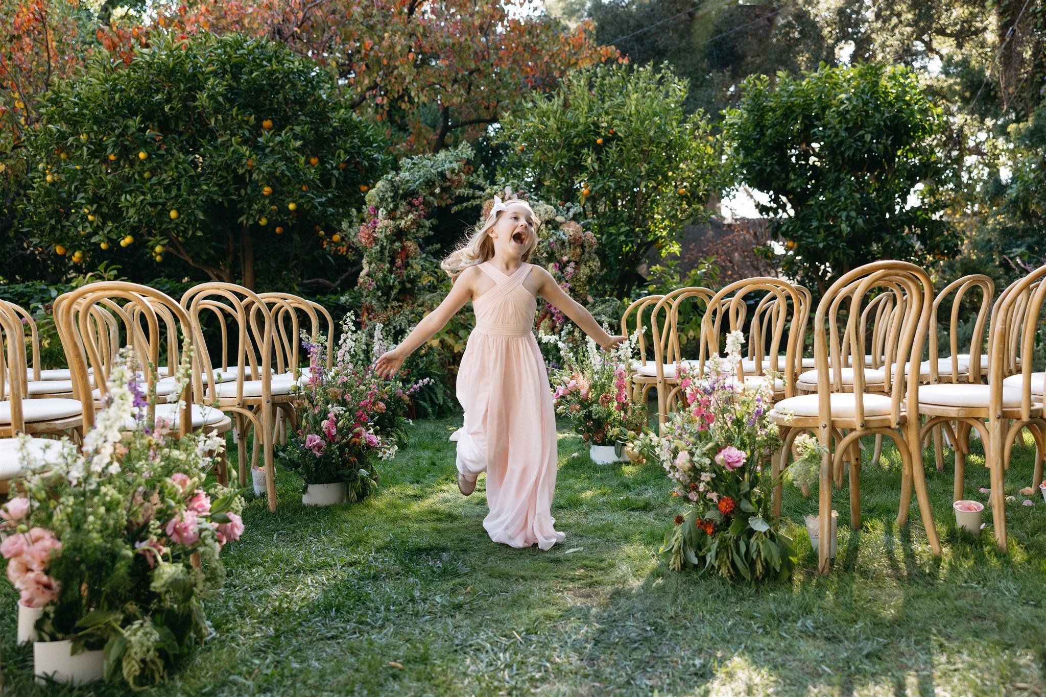 garden party style wedding ceremony complete with wildflowers everywhere