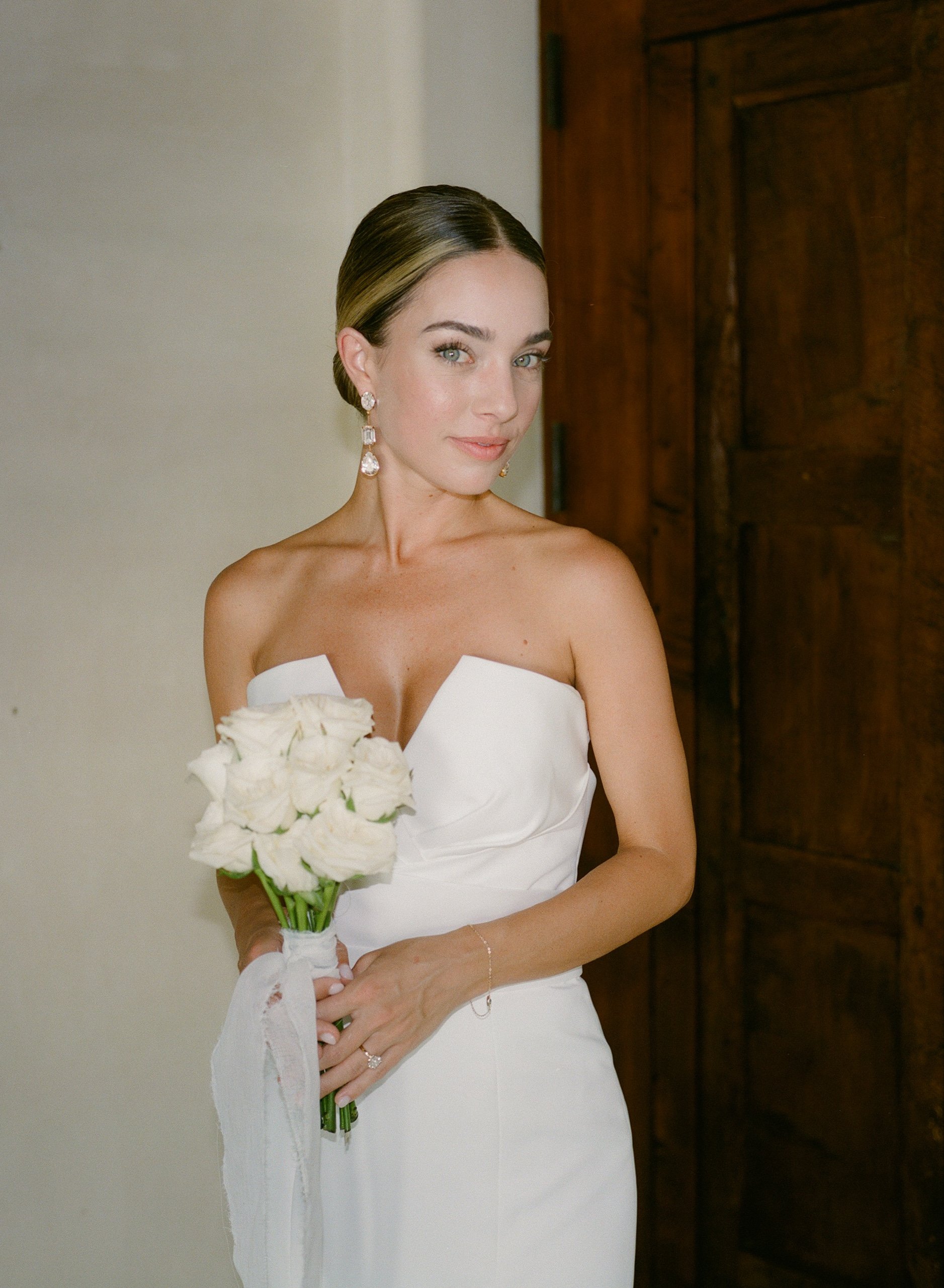 bride's chic and modern bridal hair and makeup look pairs beautifully with her mexico venue
