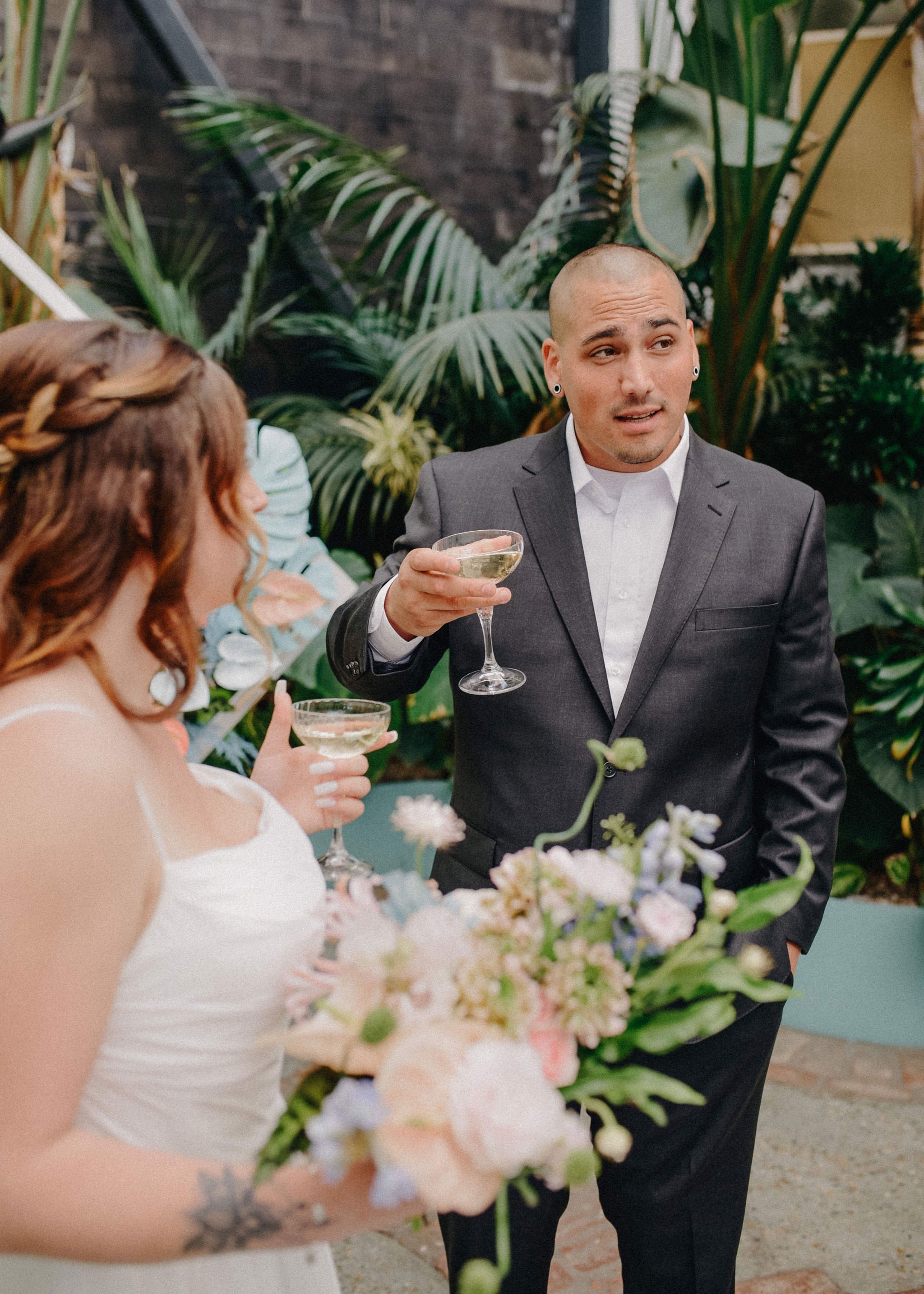 bride and groom enjoy drinks before their wedding ceremony in downtown los angeles