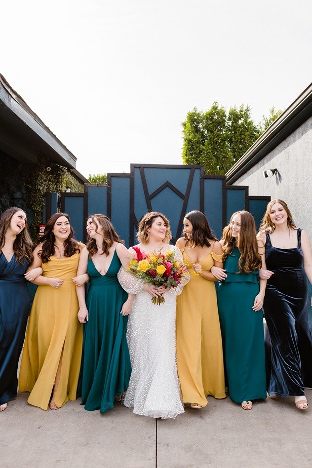 bridal party full of color in highland park for the wedding ceremony and reception at the fig house