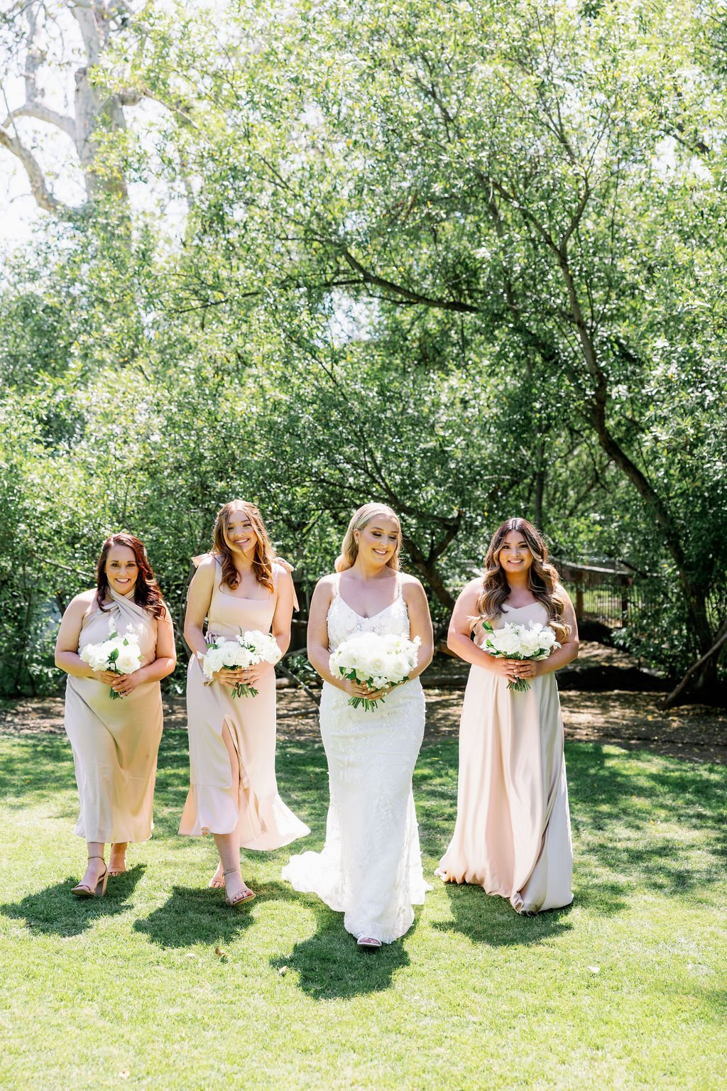 bride and bridesmaids look effortless and chic with LA hair and makeup team before their wedding at calamigos ranch, in malibu, CA 