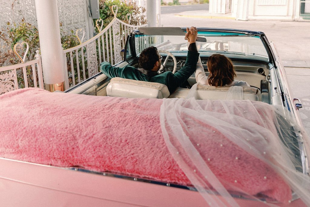 fun and cliche las vegas elopement at the little white wedding chapel