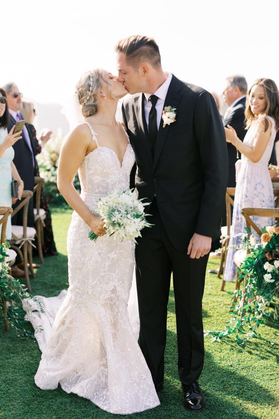 bride and groom's wedding ceremony on the cliffs of malibu canyon at cielo farms