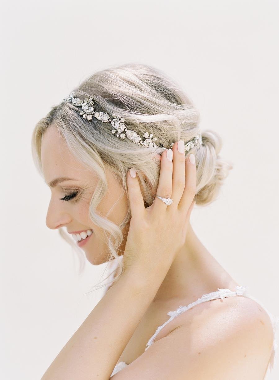 tousled and romantic bridal updo hairstyle