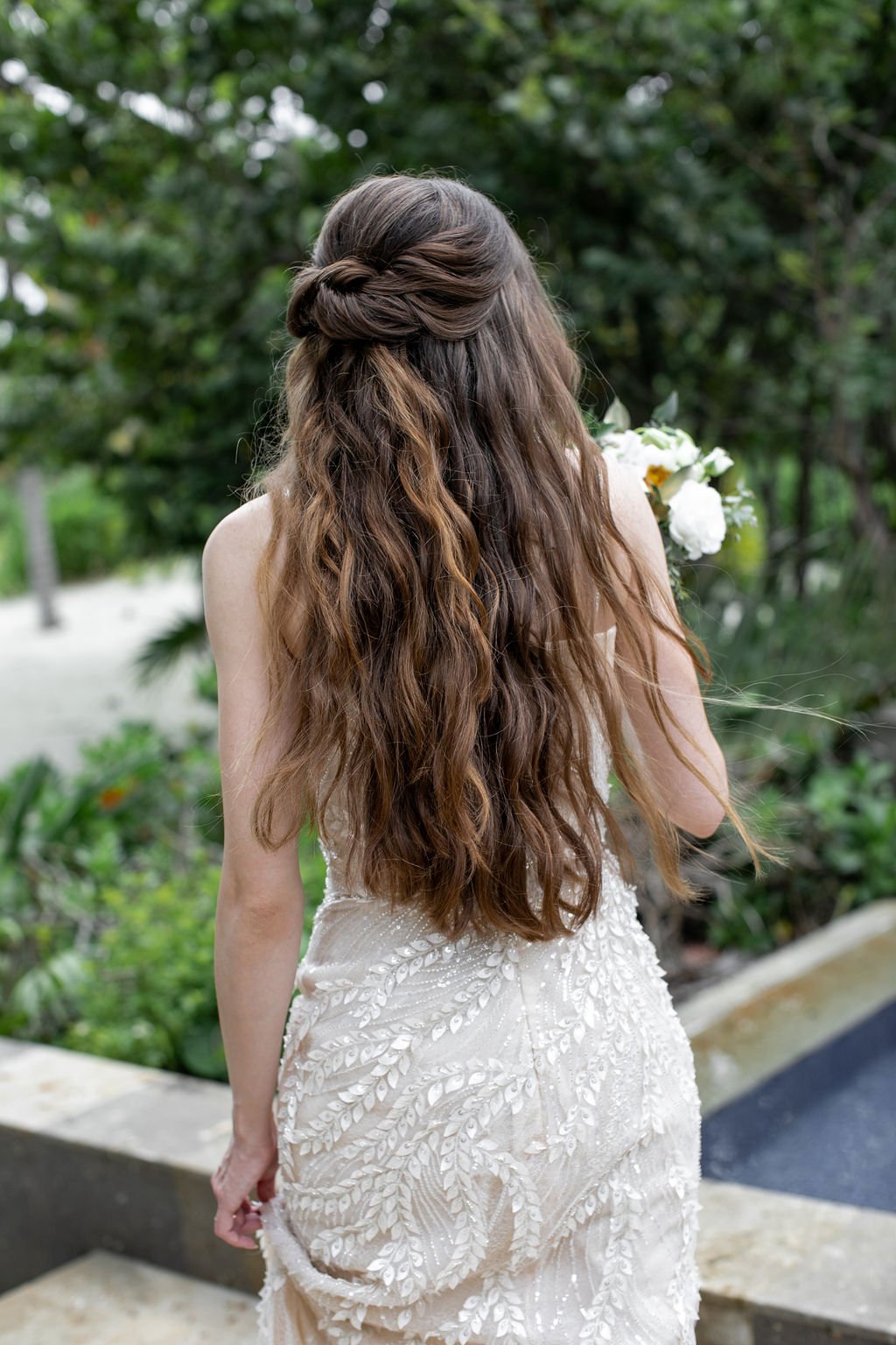 half up half down bridal hairstyle for bride's wedding at banyan tree mayakoba in riviera maya, mexico