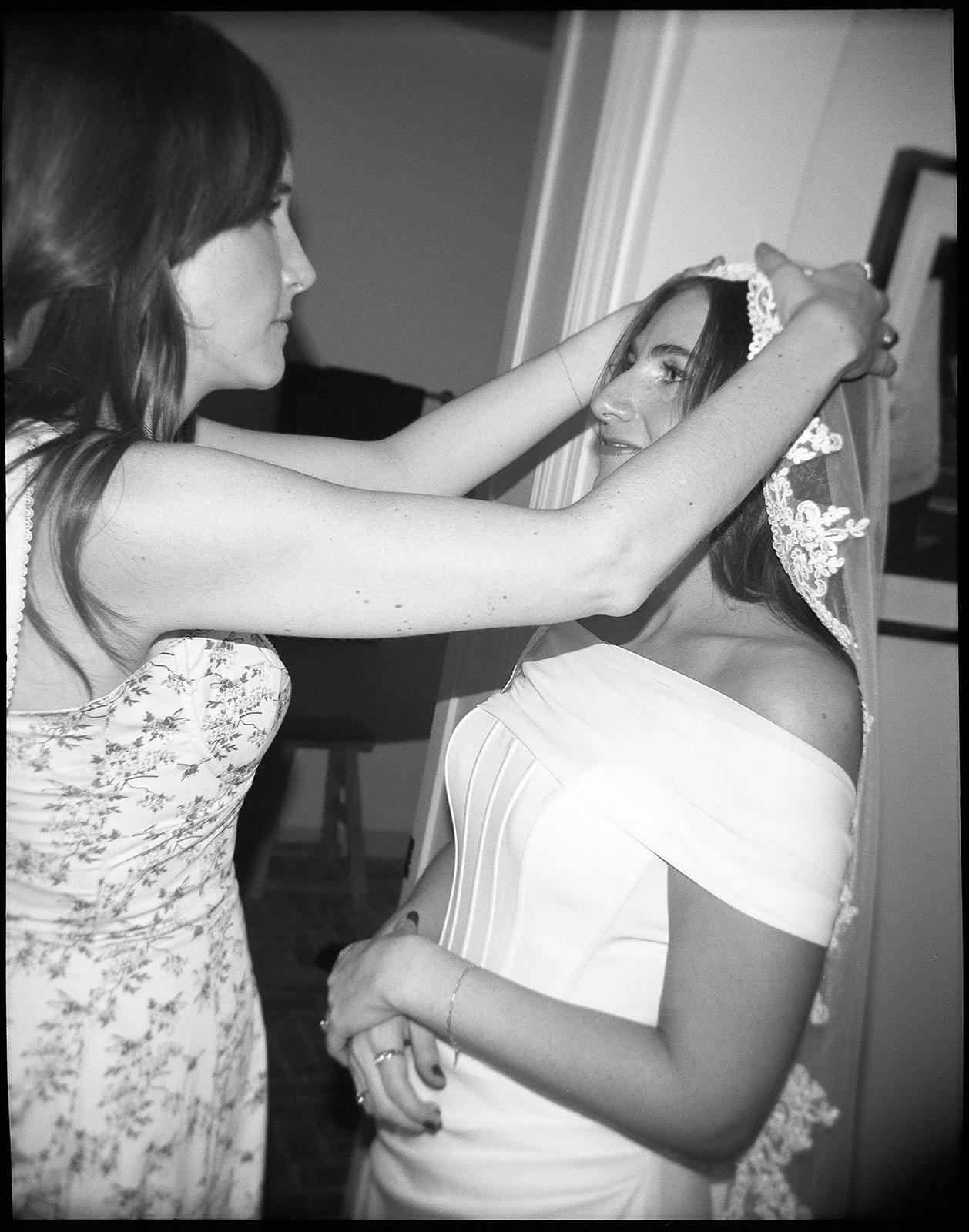 bridal veil being placed for this Los angeles bride's wedding ceremony