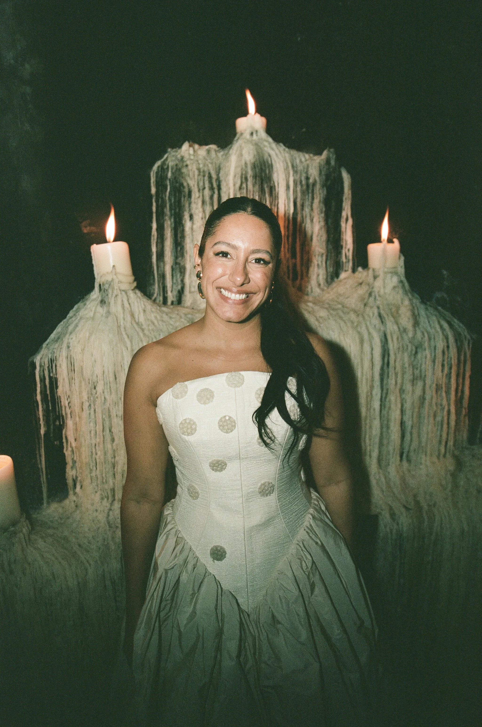 rehearsal dinner bridal hairstyle is a slicked back snatched ponytail