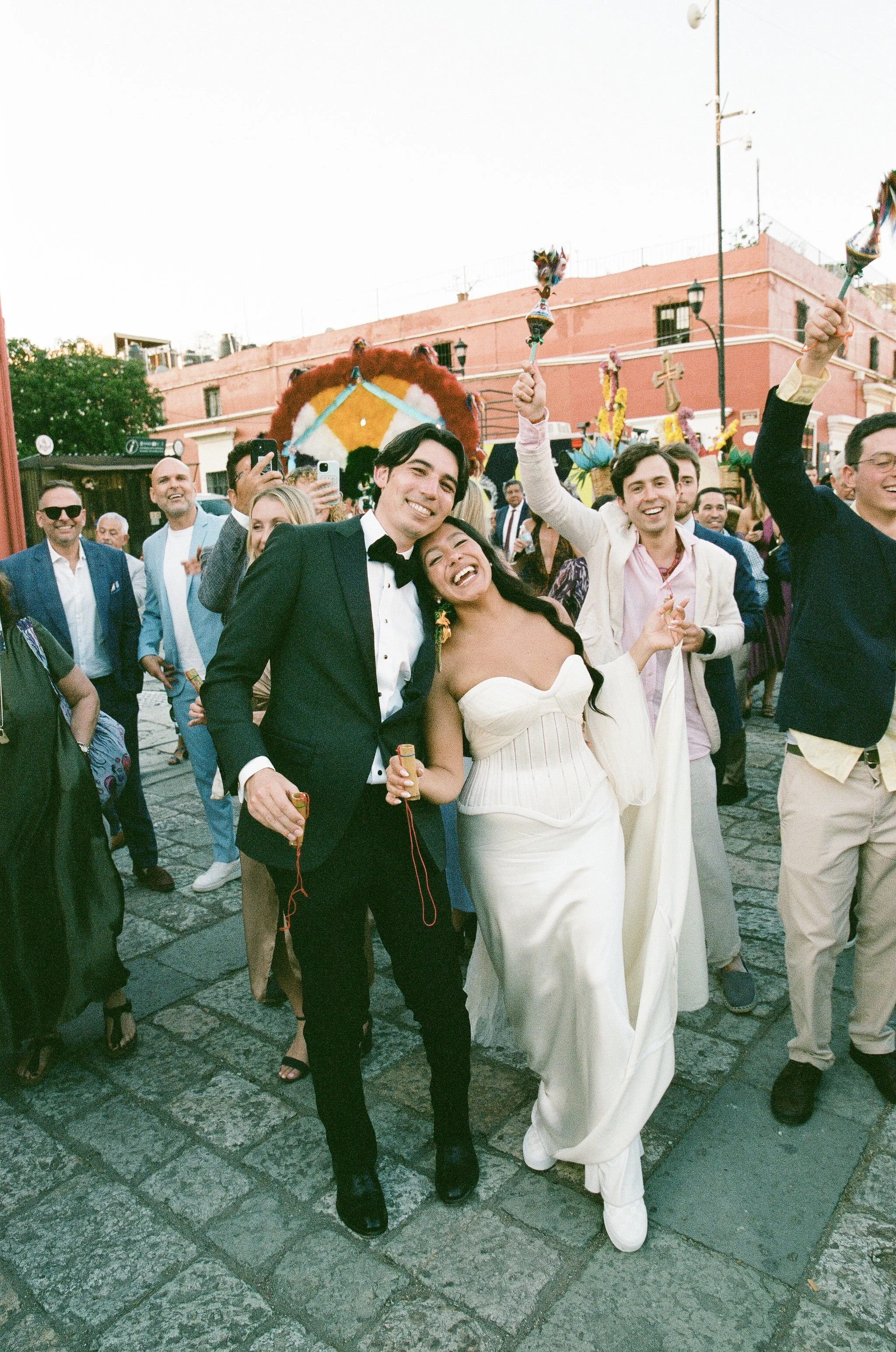 A deep rooted tradition of Oaxaca weddings is the Calenda, a vibrant street parade with brass bands, fireworks, dancing, giant puppets, and of course mezcal