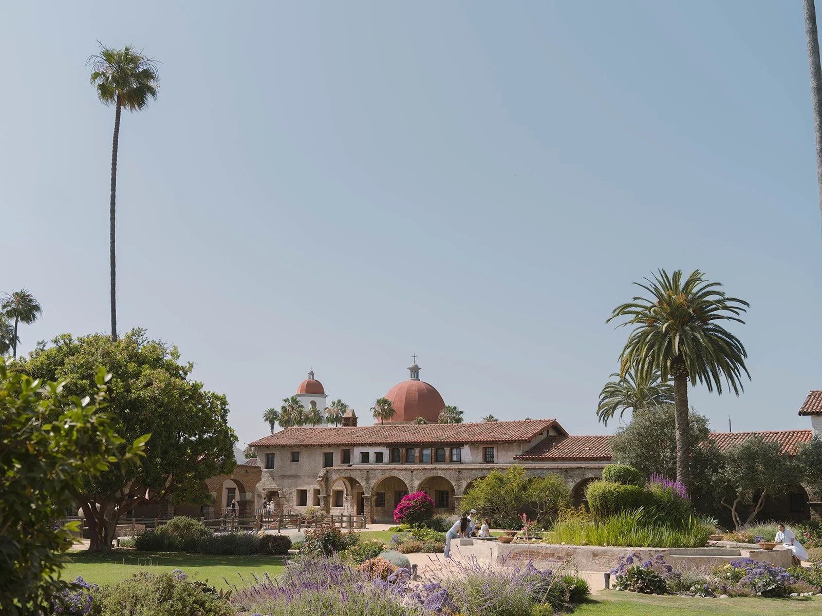 summer wedding day at serra plaza, a historic venue in san juan capistrano.