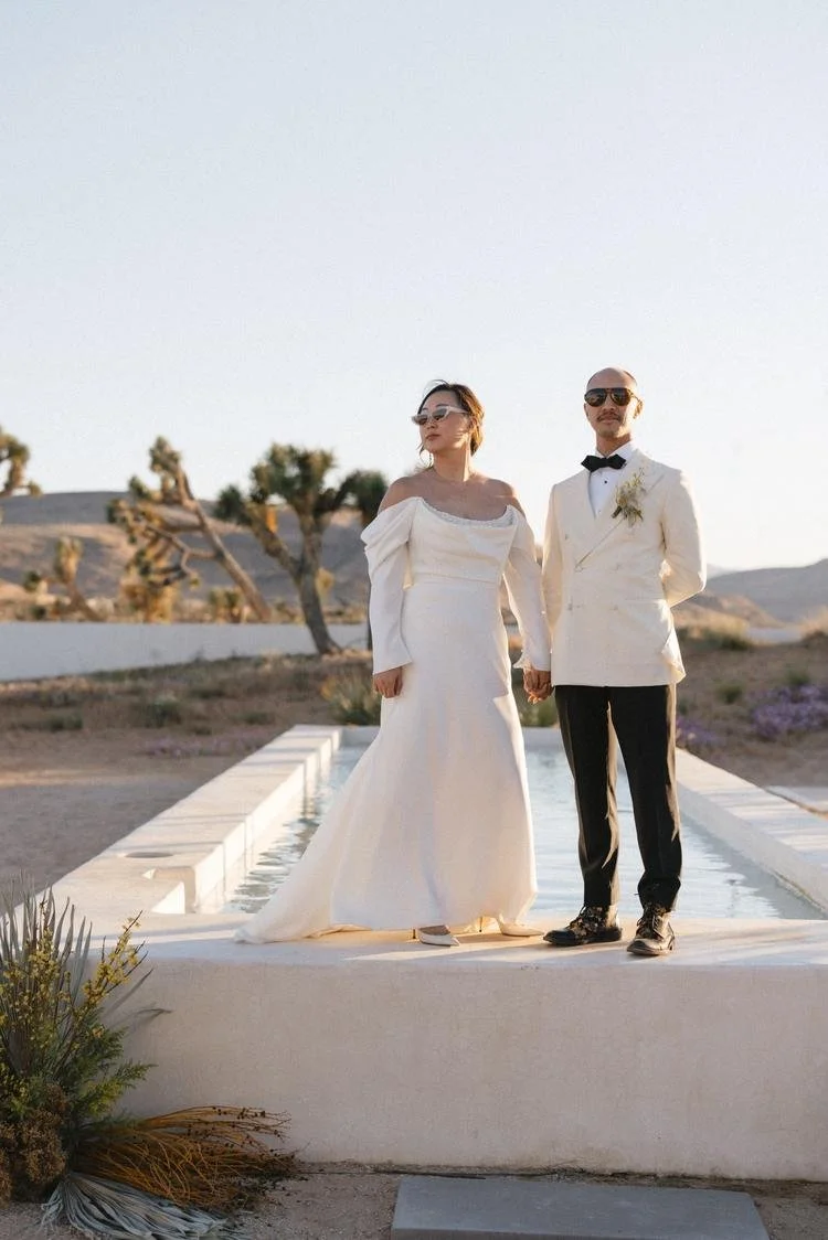 fashion forward couple travel to joshua tree desert for destination wedding weekend