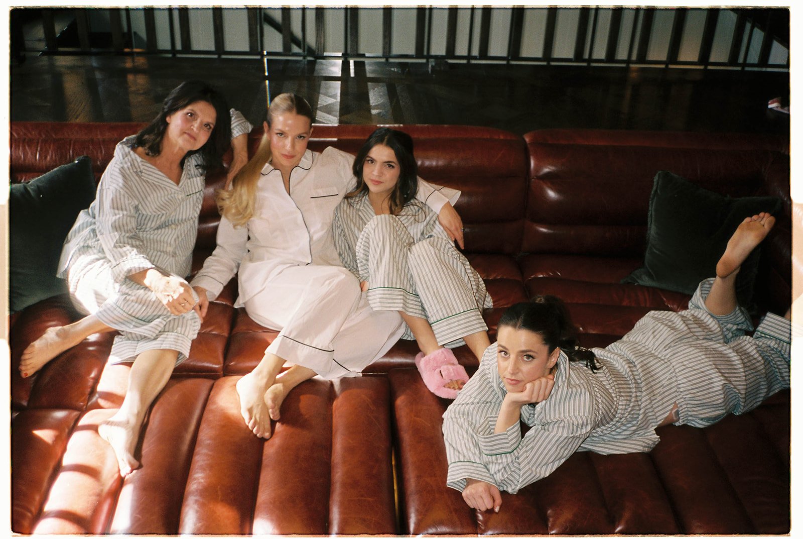 bride and bridesmaids pose for getting ready photos before iconic wedding ceremony in hollywood