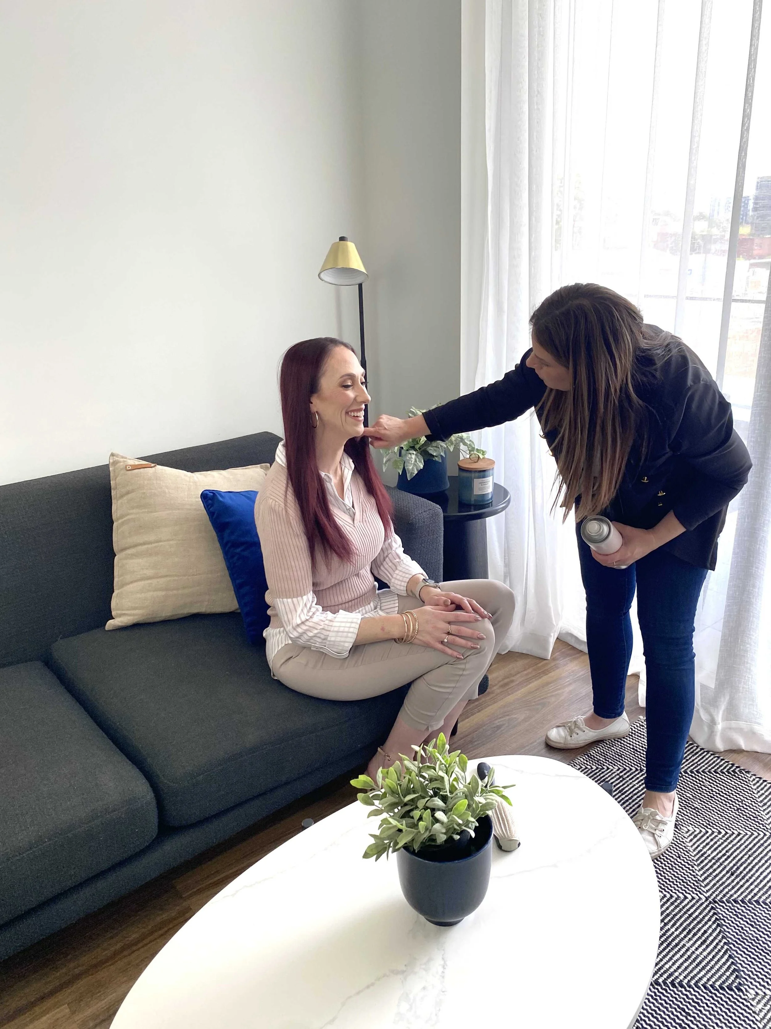 Makeup artist on set at a Penrith brand photoshoot