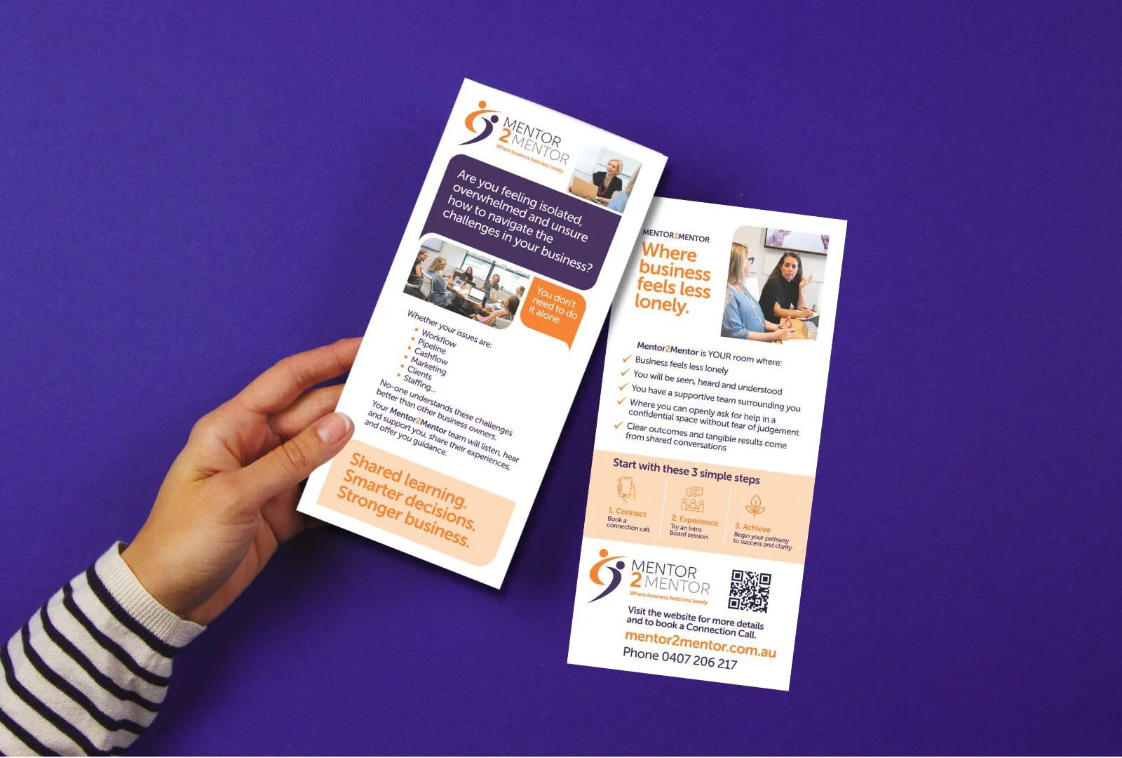 business owner holding a marketing flyer