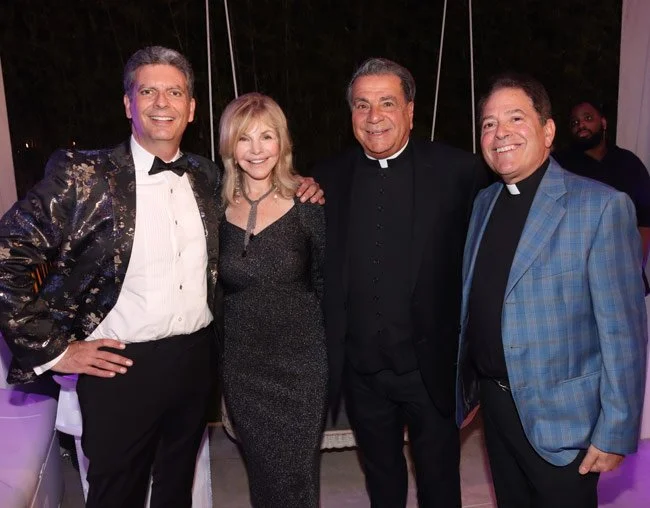 Mike McGann, Judy Gilbert, Monsignor Jamie Gigantiello, and Monsignor David Cassato.