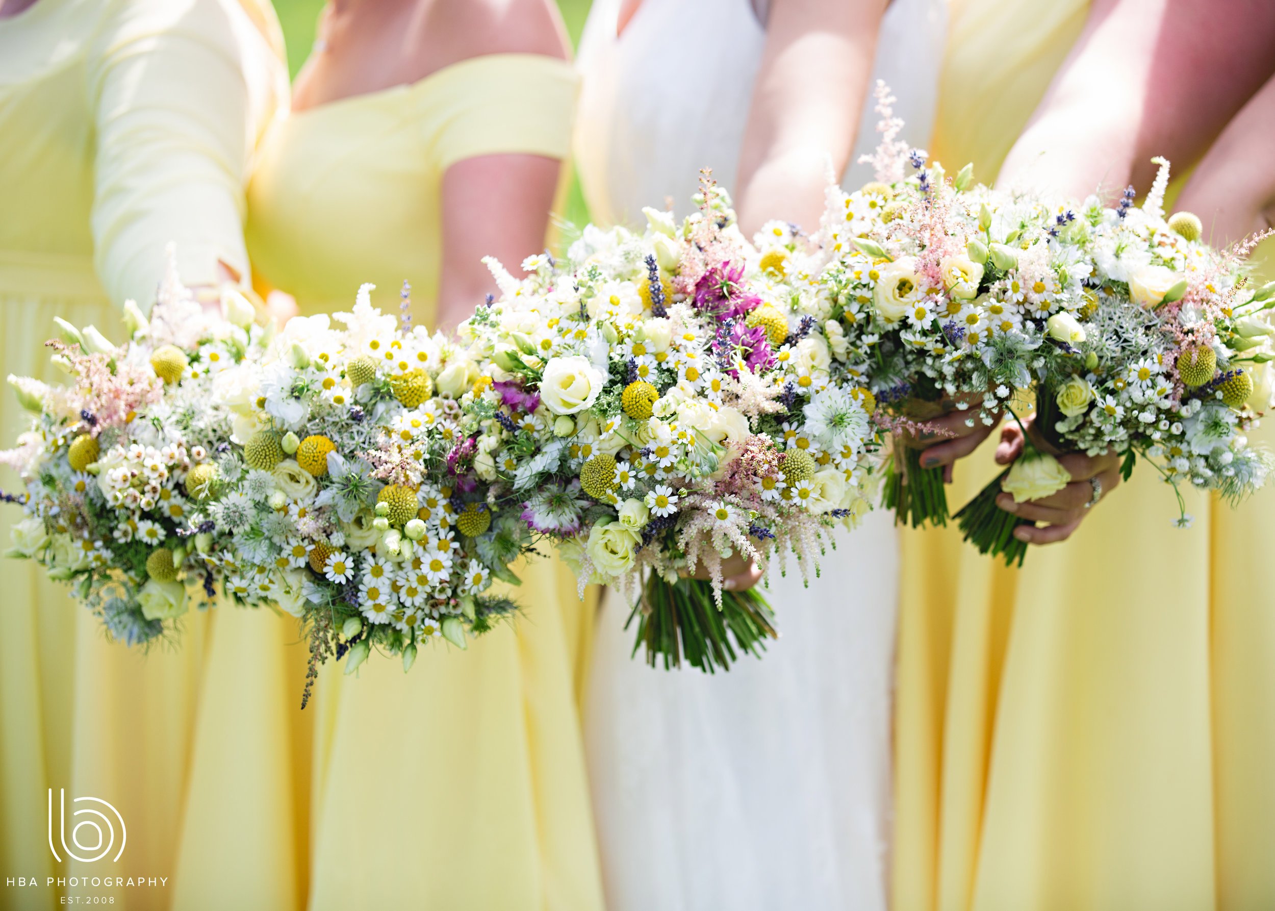 Beautiful bridal party bouquets by Tineke Floral Designs