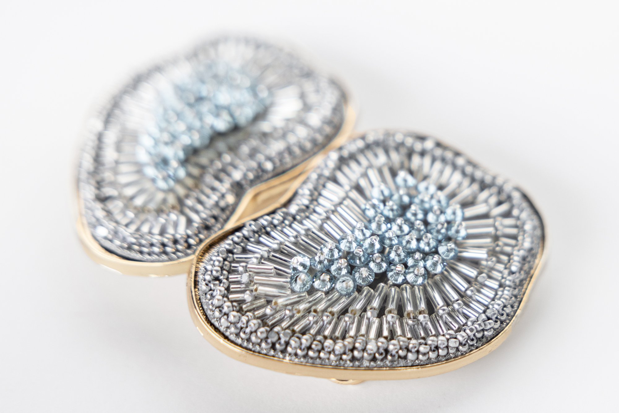 Gold silver and teal beaded oyster belt buckle