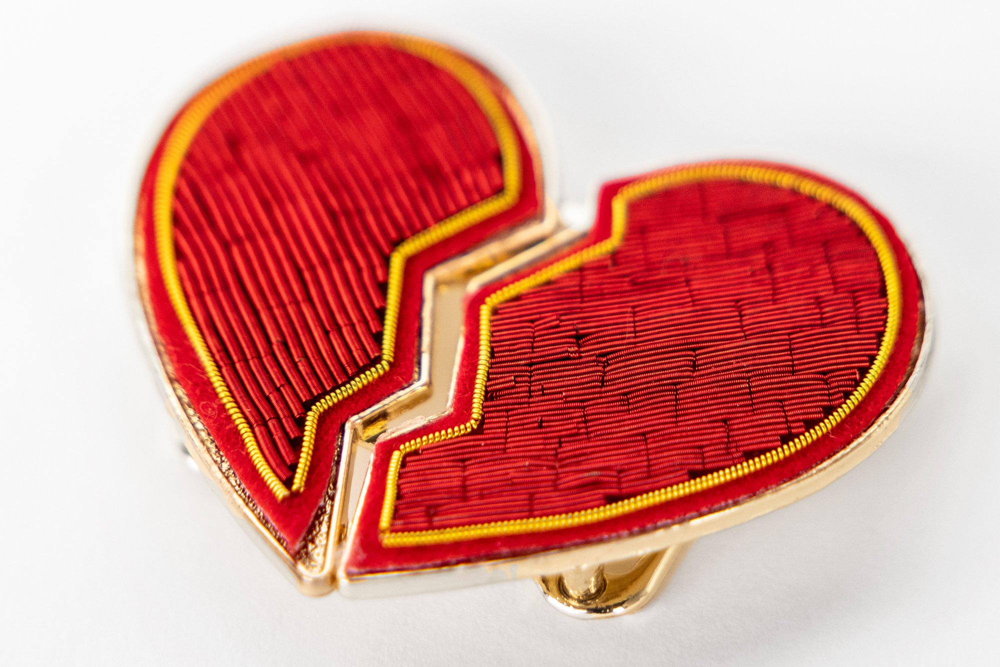 Red and gold beaded broken heart belt buckle