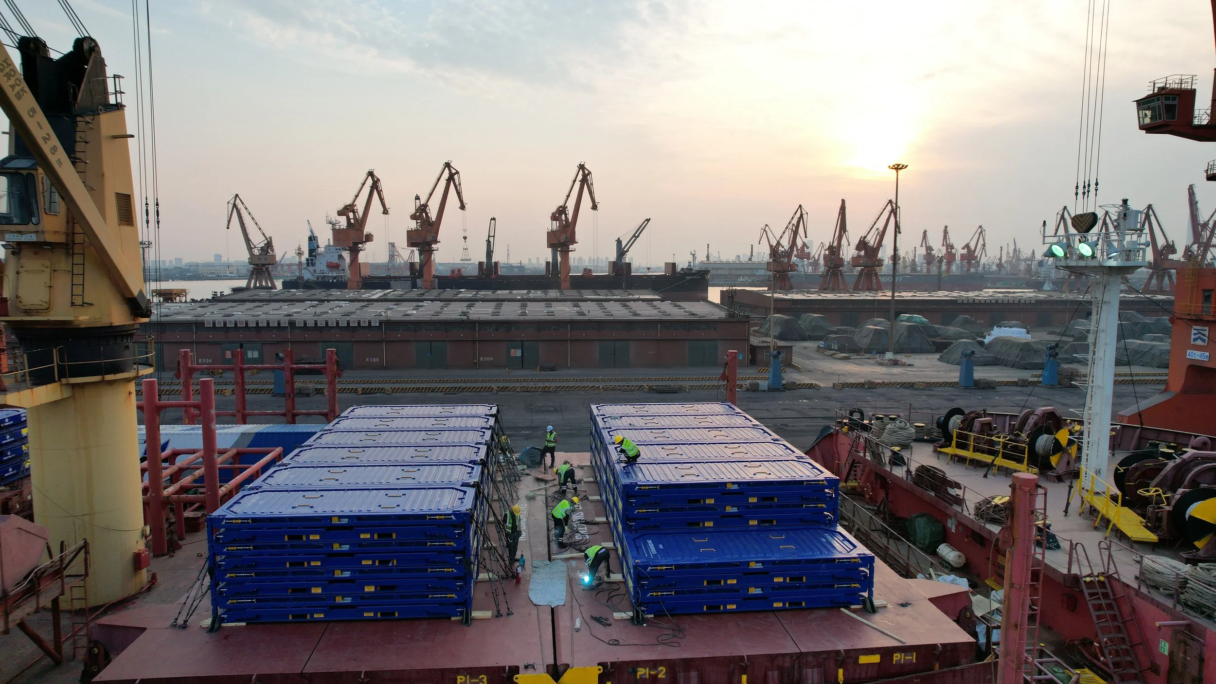 folded containers on deck