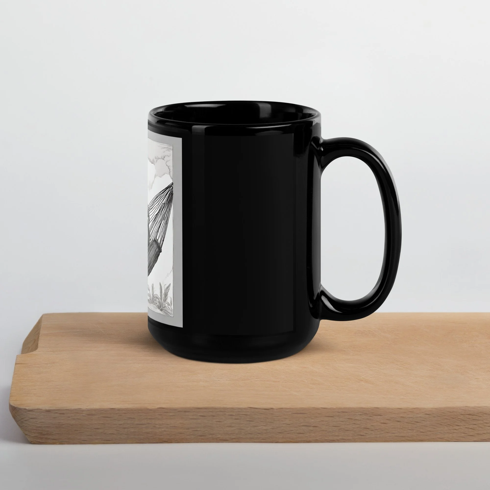 black-glossy-mug-black-15-oz-handle-on-right-672758716695d.jpg