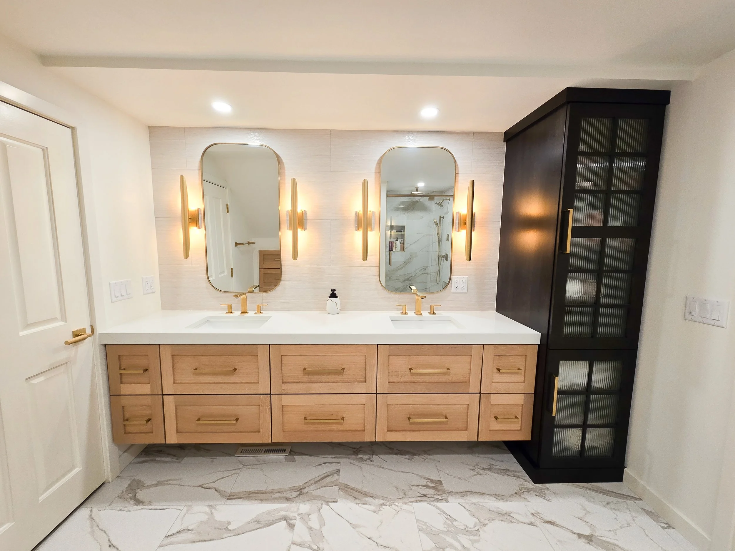 High-End Surfaces: Topped the vanity with a bold 2-inch thick build-up quartz countertop designed for bathroom in Wisconsin Dells.