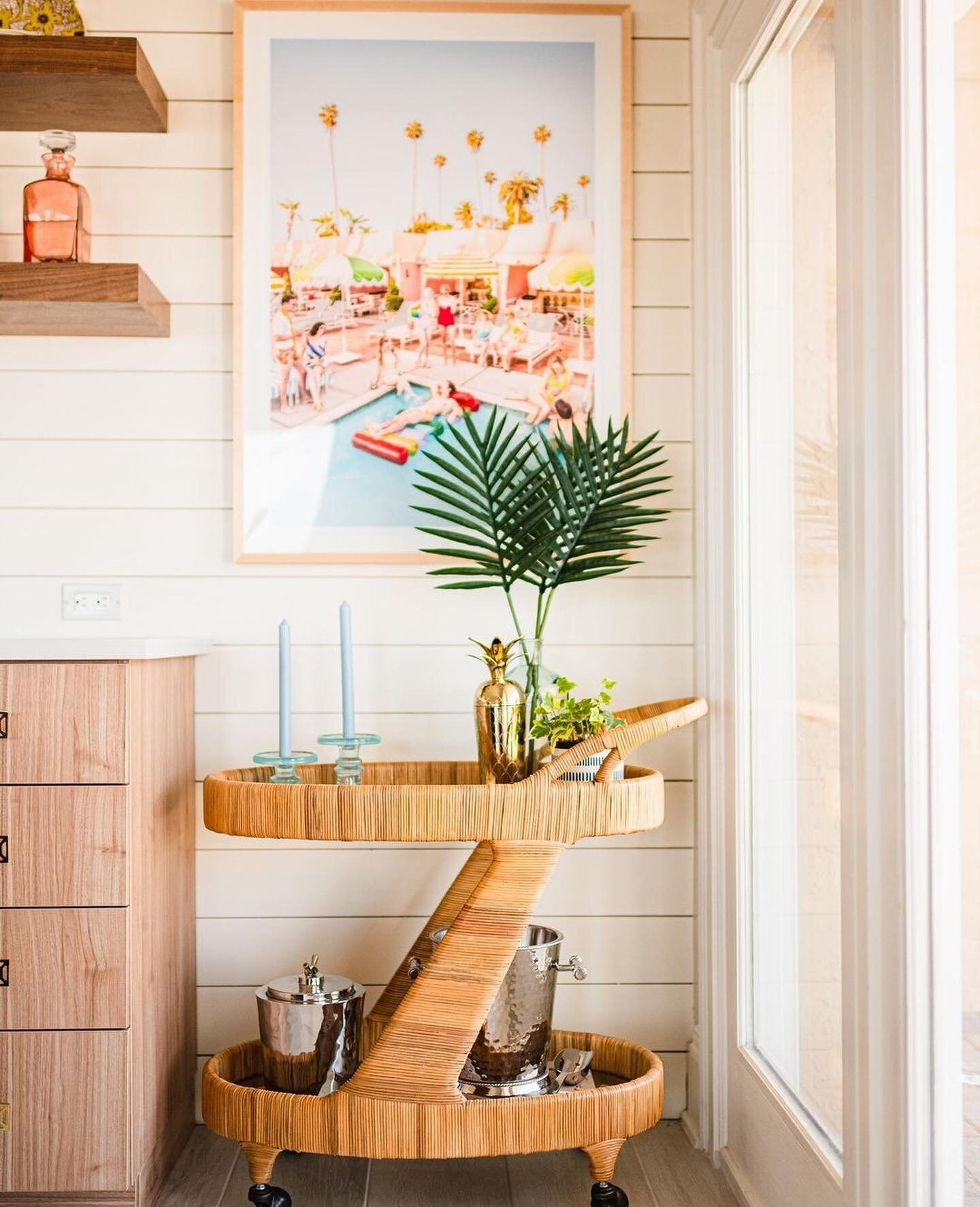 Cheers to the weekend with @madegoods 🥂

The Lulu Bar Cart made a lovely beachy addition to this space designed by @made_designcompany! Everything about this bar cart is perfection from the wrapped rattan to the castor wheels that make the bar cart 