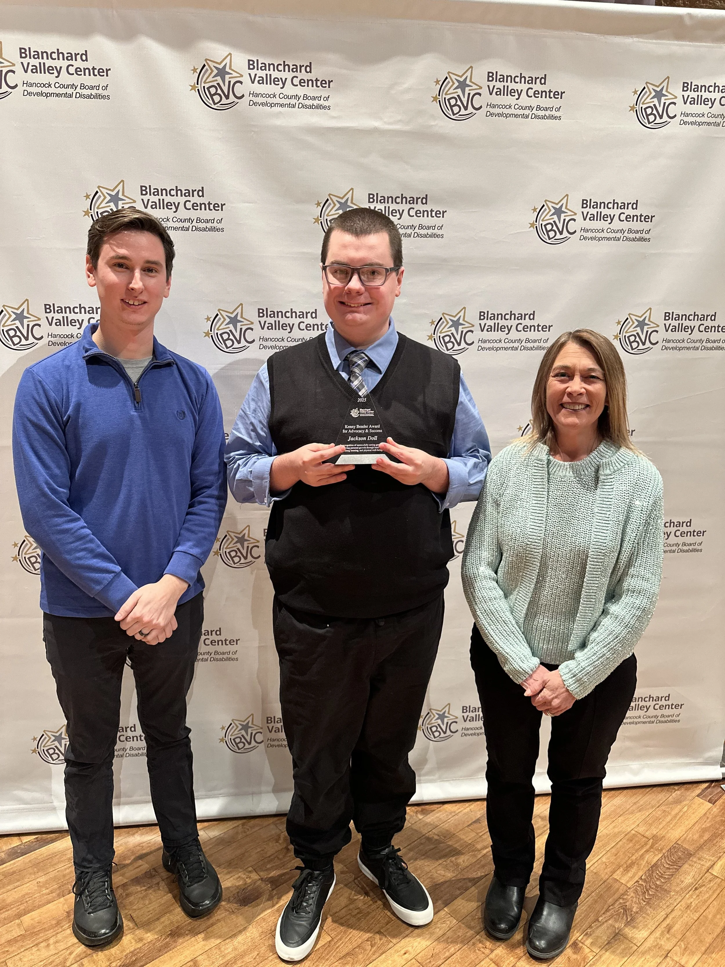 Jackson Doll with the Kenny Bender Award for Advocacy & Success