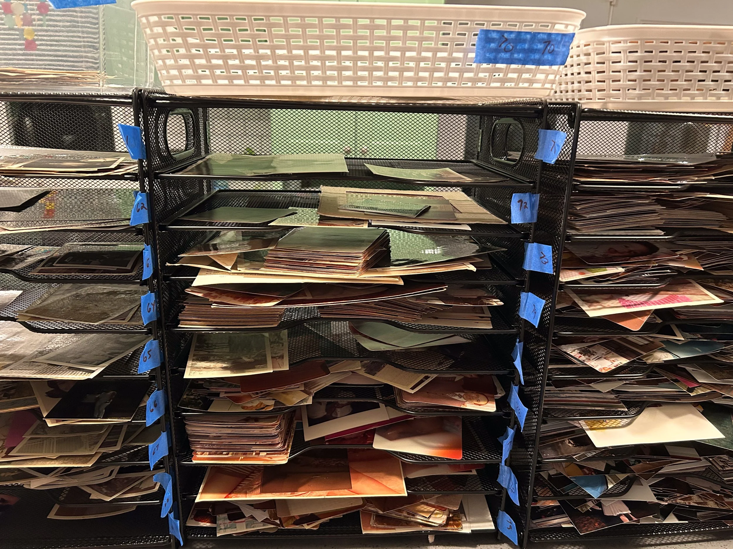 Photo sorted by year, waiting to be digitized by a professional photo organizer.