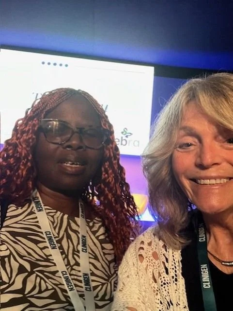 World Orphan Drug Congress Barcelona_Lauren Kopsick with Attendee.jpeg