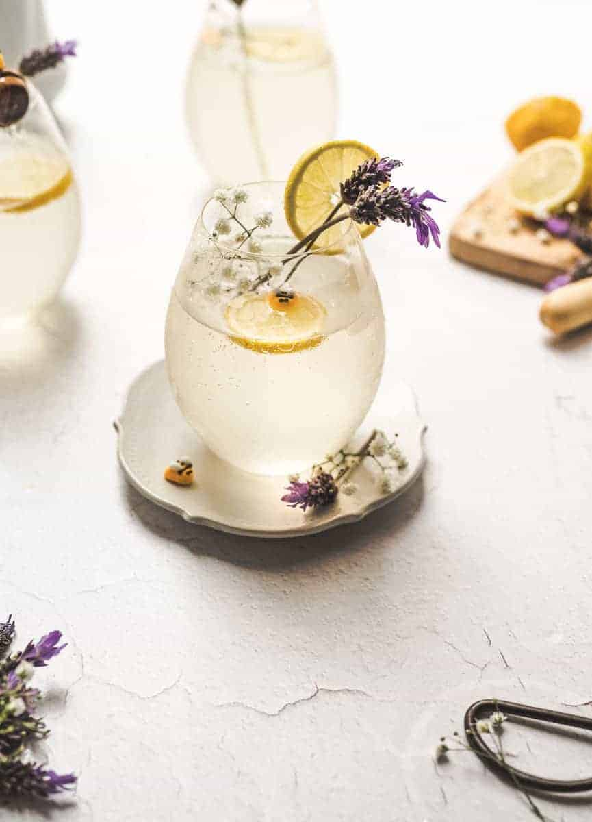A bee collecting nectar from purple lavender flowers.