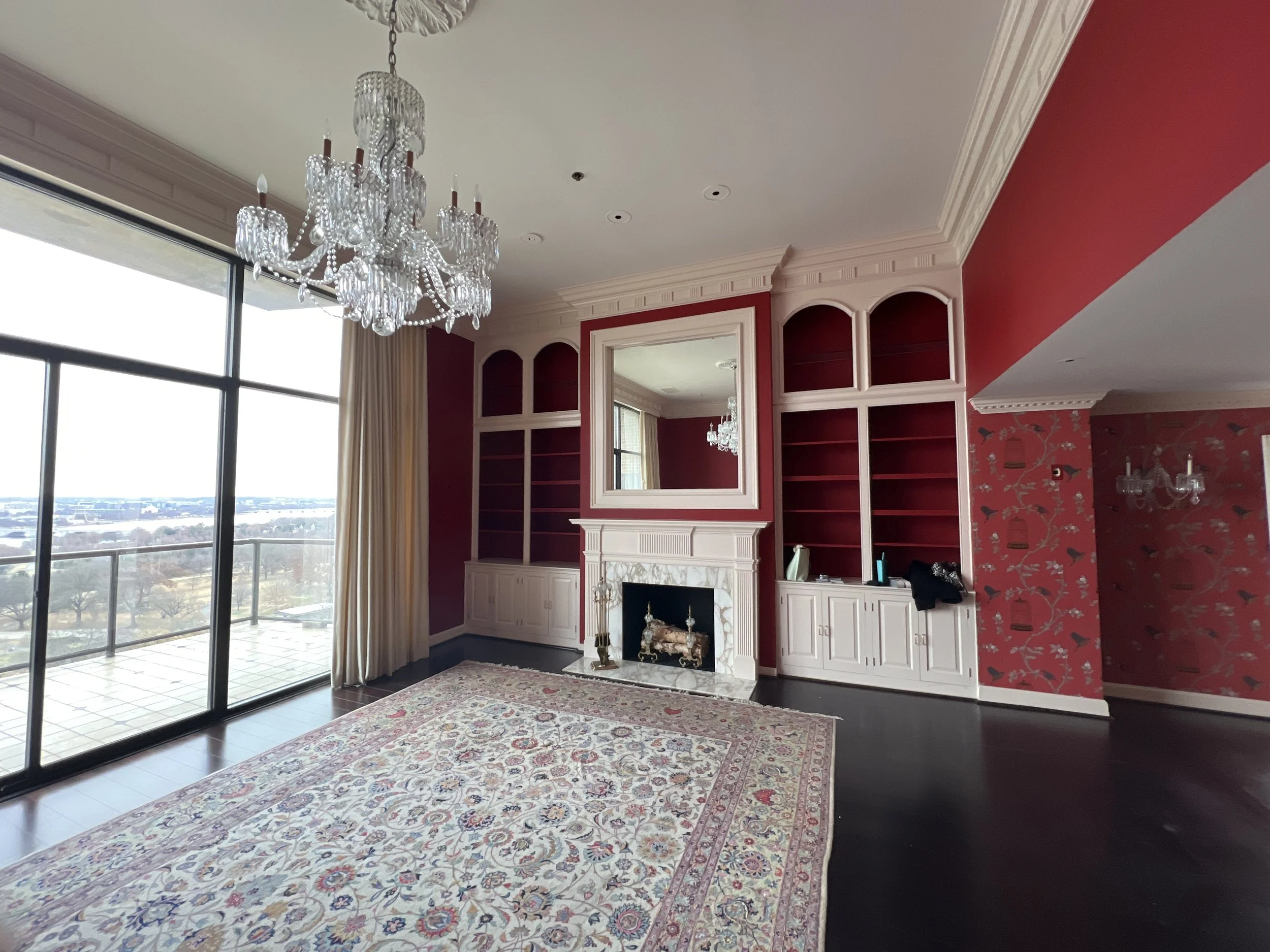 We were able to purchase this stunning hand knotted rug from the previous owner. It's now cleaned and beautifully connects the two zone floor plan. 