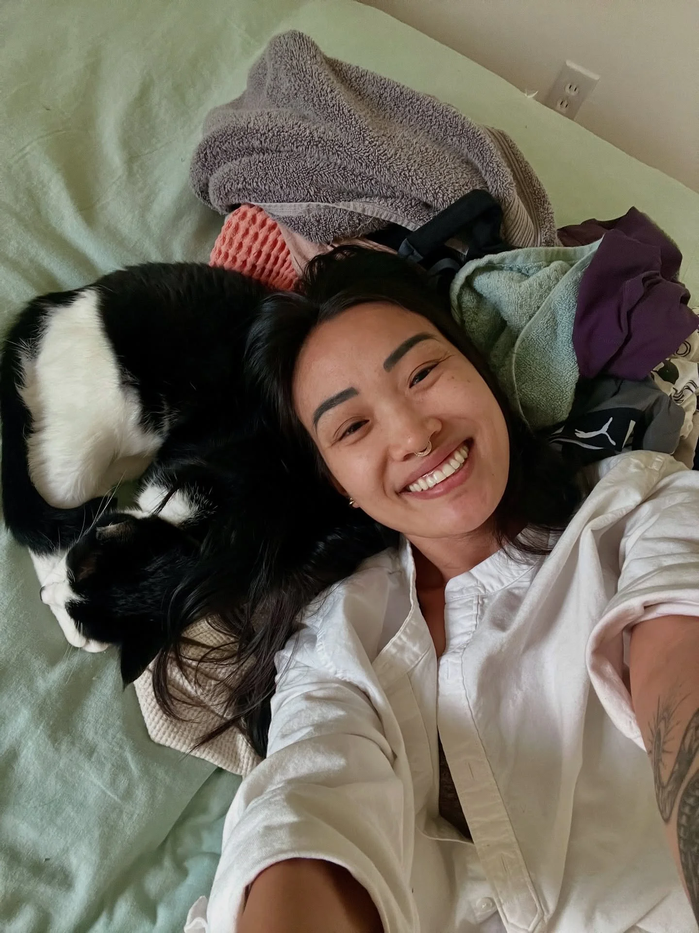 It&rsquo;s a lying on the bed with your cat in a pile of warm laundry and staring at the ceiling wondering, &ldquo;What the fuck is life right now?&rdquo; kinda day. #IYKYK