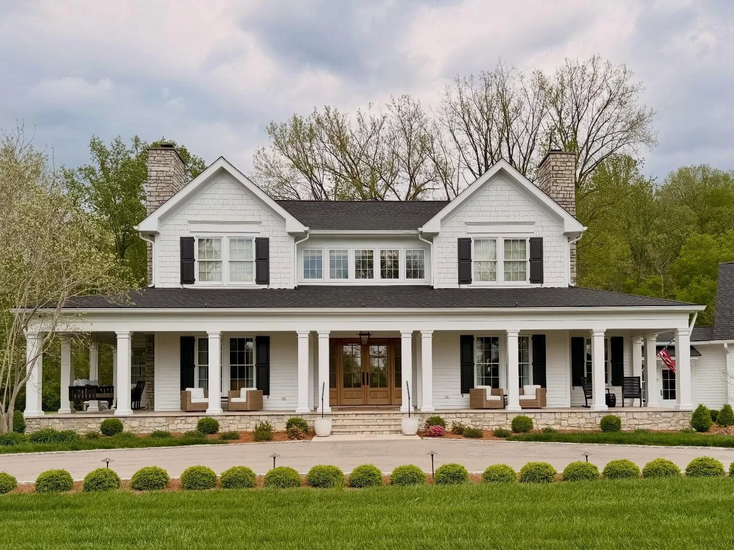 Both functional and aesthetic changes in this renovation project combined to make this house feel more comfortable and approachable. A new circular drive makes the front door actually usable; newly proportioned columns and a natural stone floor becko