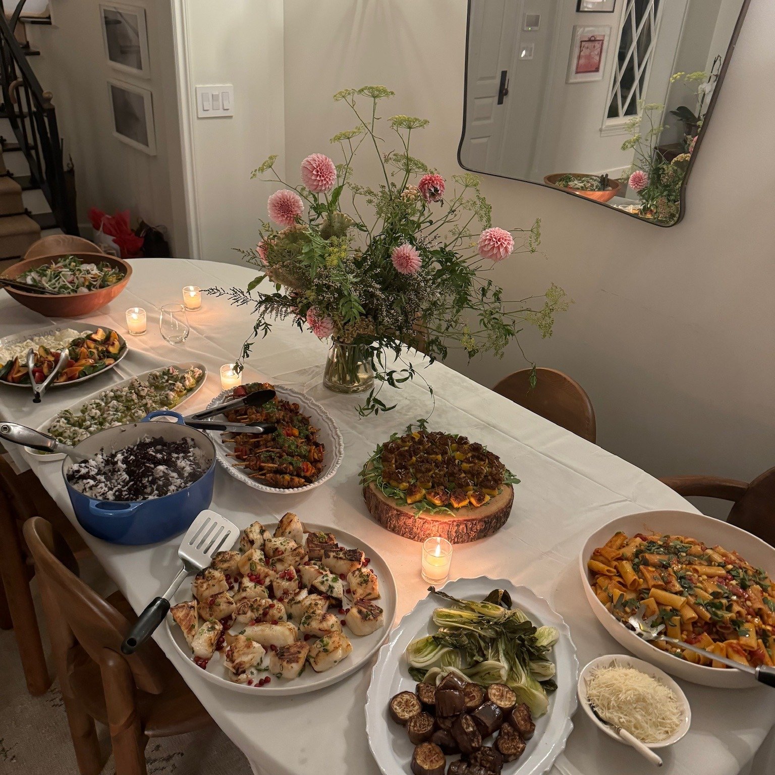 Just like the exquisite spread featured in the photo, we specialize in a range of dishes that celebrate fresh ingredients, culinary creativity, and seasonal flavors.

From hearty pasta dishes, fresh greens, roasted vegetables, to savory hors d'oeuvre