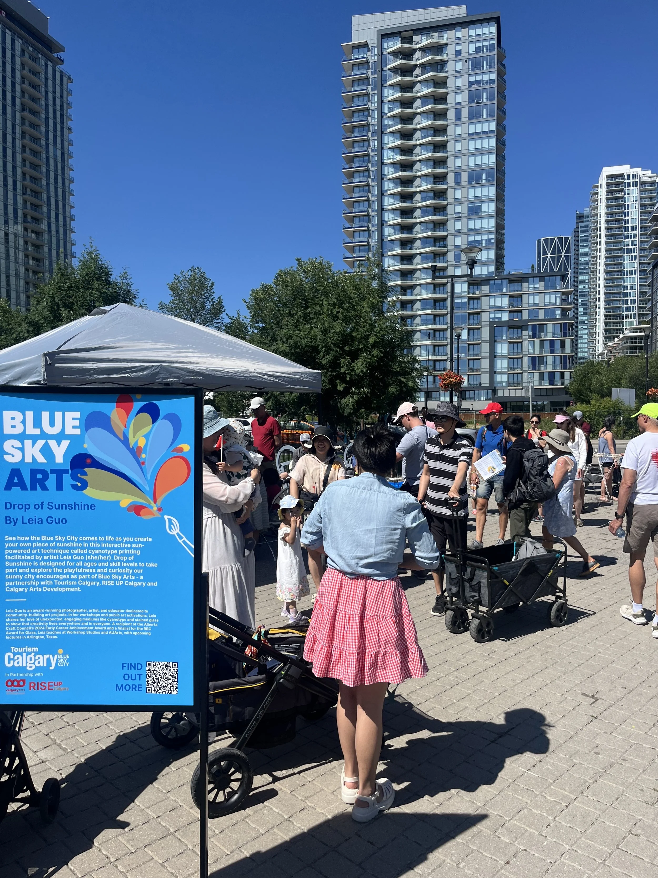 Crowd photo of Leia Guo's Blue Sky Arts activation at The Confluence on Canada Day.