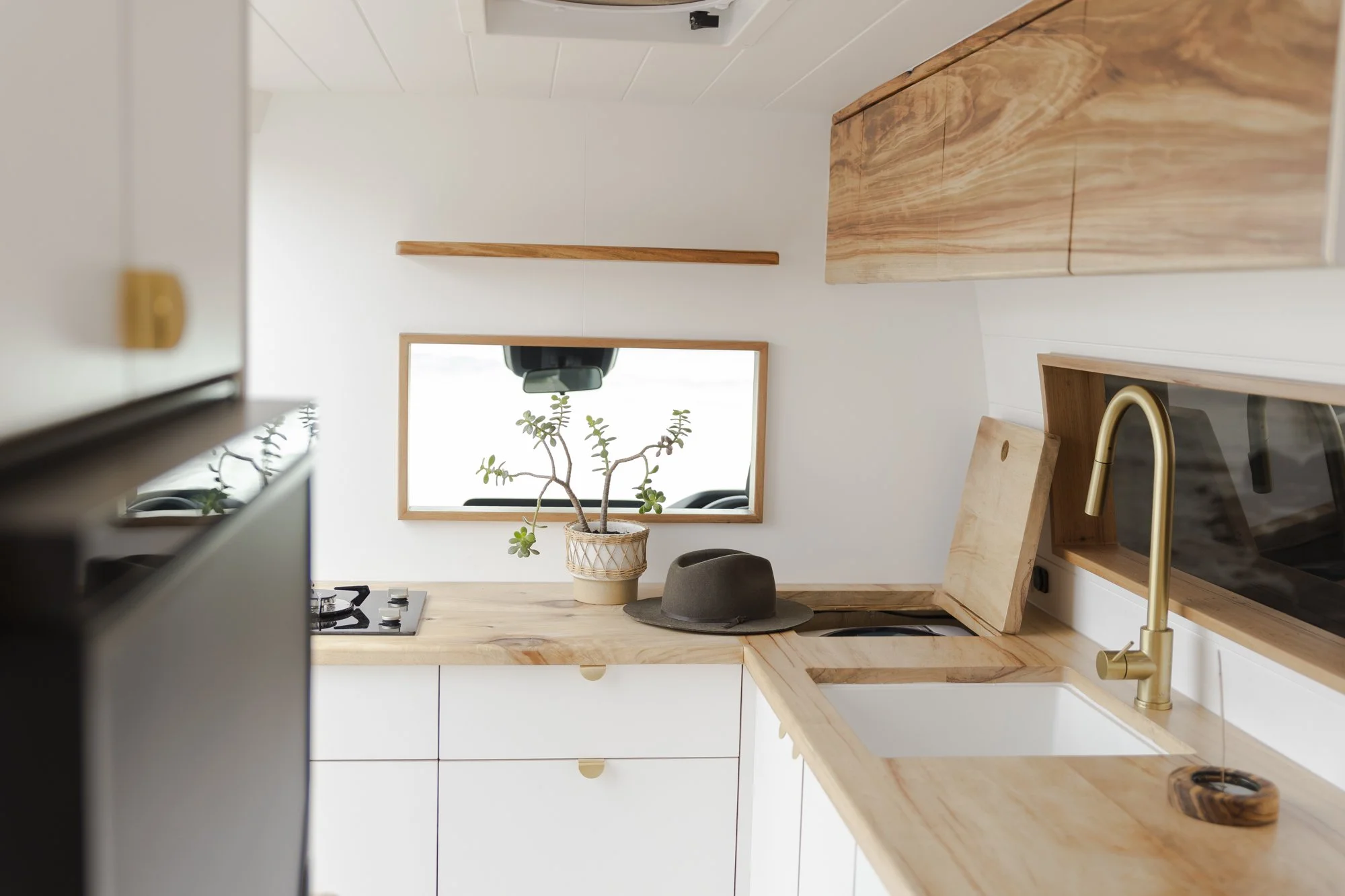 Natural timber cabinetry inside Daisy