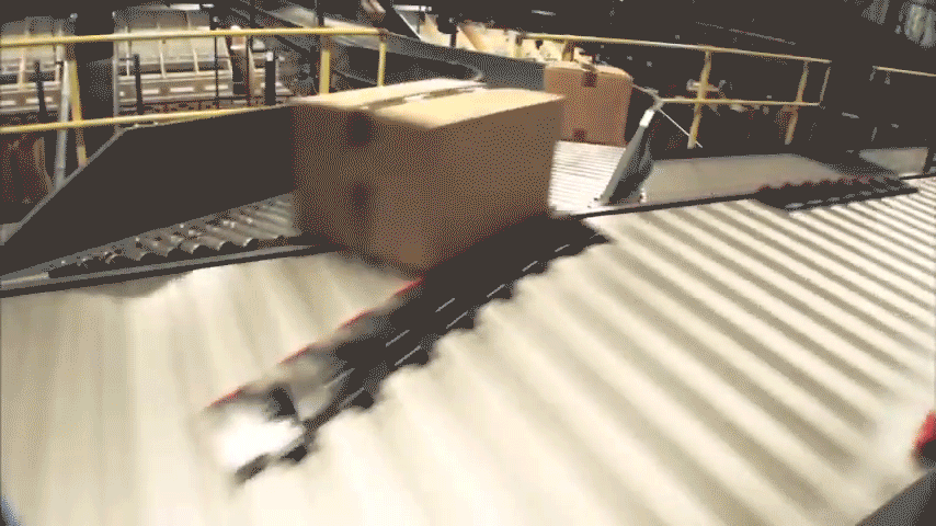 Sizable Intelligrated conveyor system including high-speed shoe sorter for sale