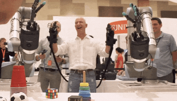 Jeff Bezos, a pair of haptic robot hands, and a new tactile technology