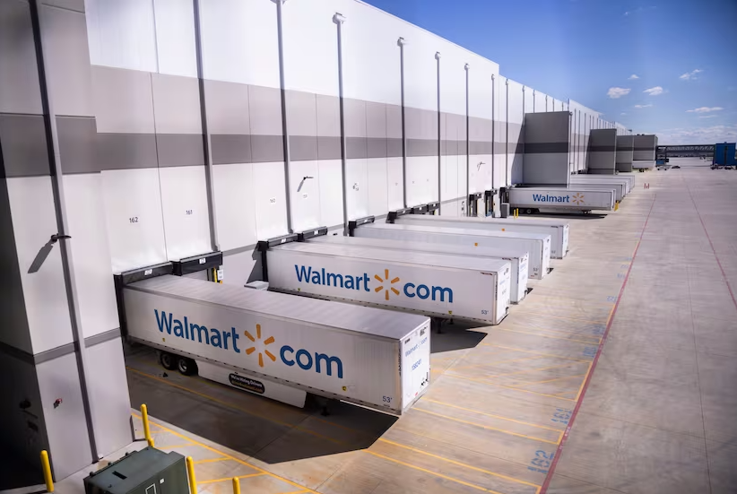  Trailers sit outside of Walmart’s online fulfillment center in Lancaster ready to be either unloaded with new merchandise or filled with boxes to be shipped to customers. (Juan Figueroa) 