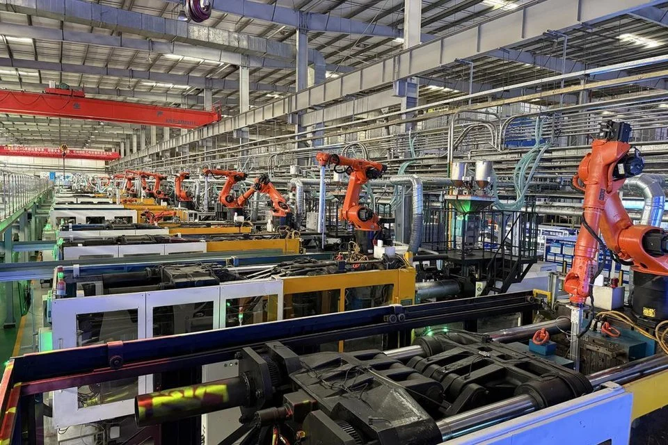 ‘Every day, we think about how to upgrade’: China’s factories see rise in robot adoption