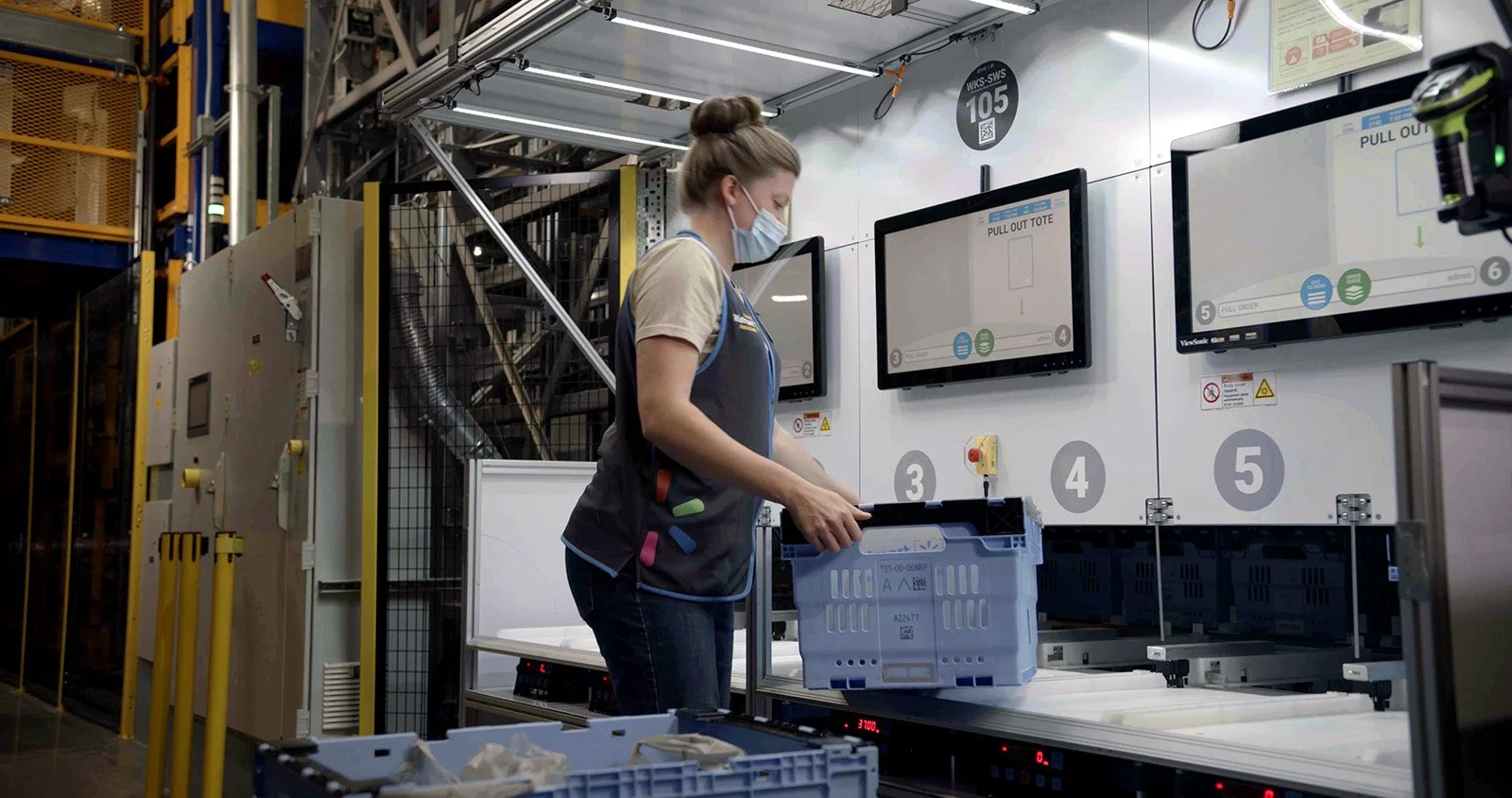 walmart-associate-handling-an-order-in-a-local-fulfillment-center.jpg