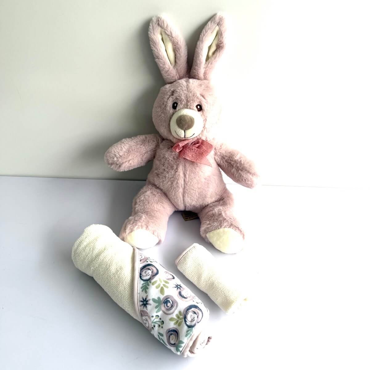 Pink bunny plush toy with hooded baby towel and washer set for a newborn baby girl gift hamper