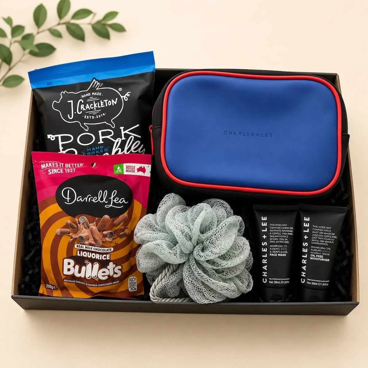 The Everyday Man Gift Hamper with toiletry bag, Charles + Lee face wash and moisturiser, body wash, liquorice bullets and pork crackles – free same-day Gold Coast delivery