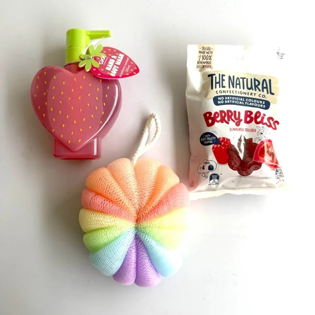 Strawberry hand and body wash with rainbow body washer and Berry Bliss lollies included in the gift hamper