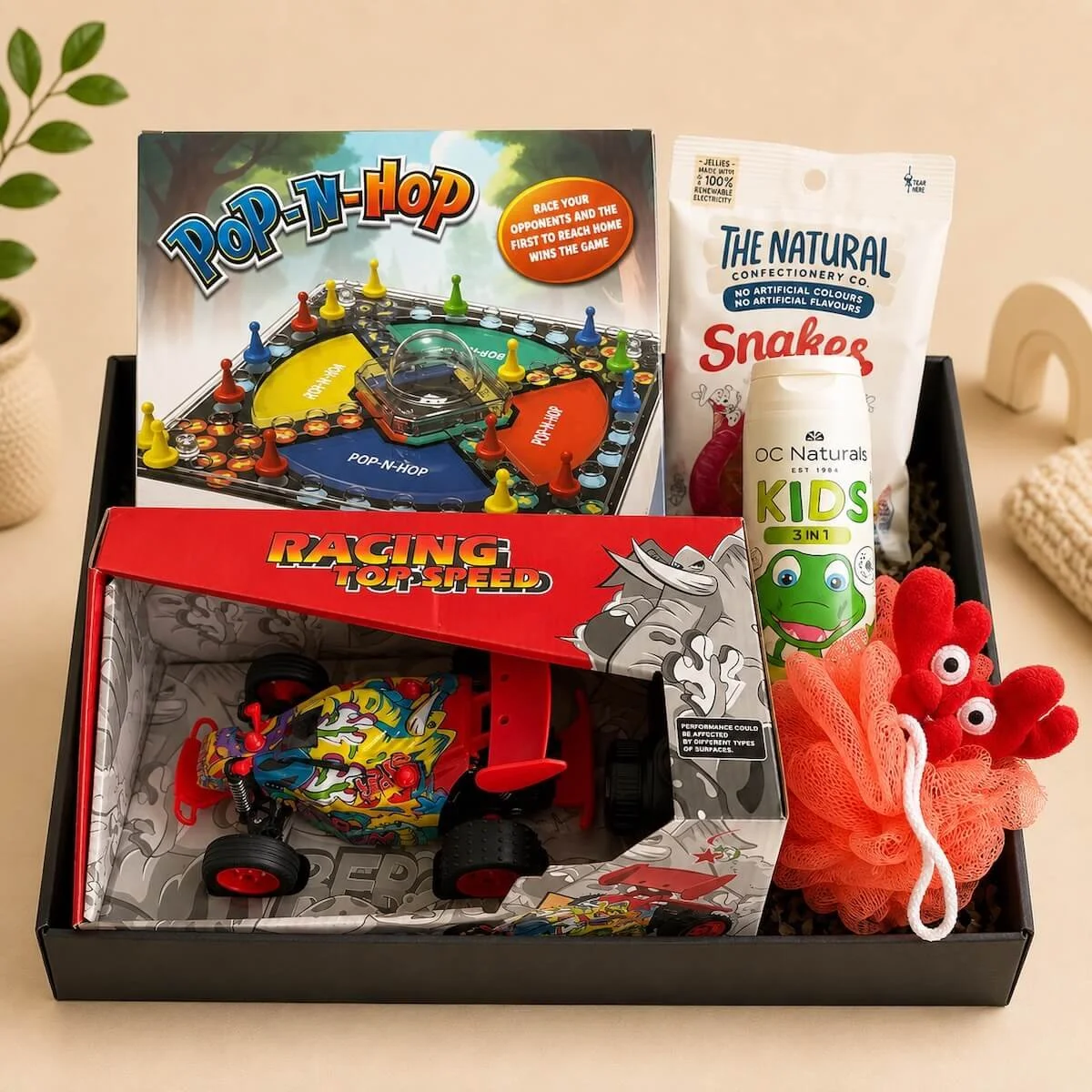 Speed Racer Gift Hamper with remote control racing car, Pop and Hop game, kids body wash and snake lollies