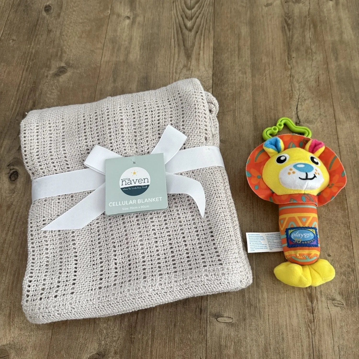 Cotton blanket and rattle toy included in the sweet dreams gift hamper delivered Gold Coast Same-day.
