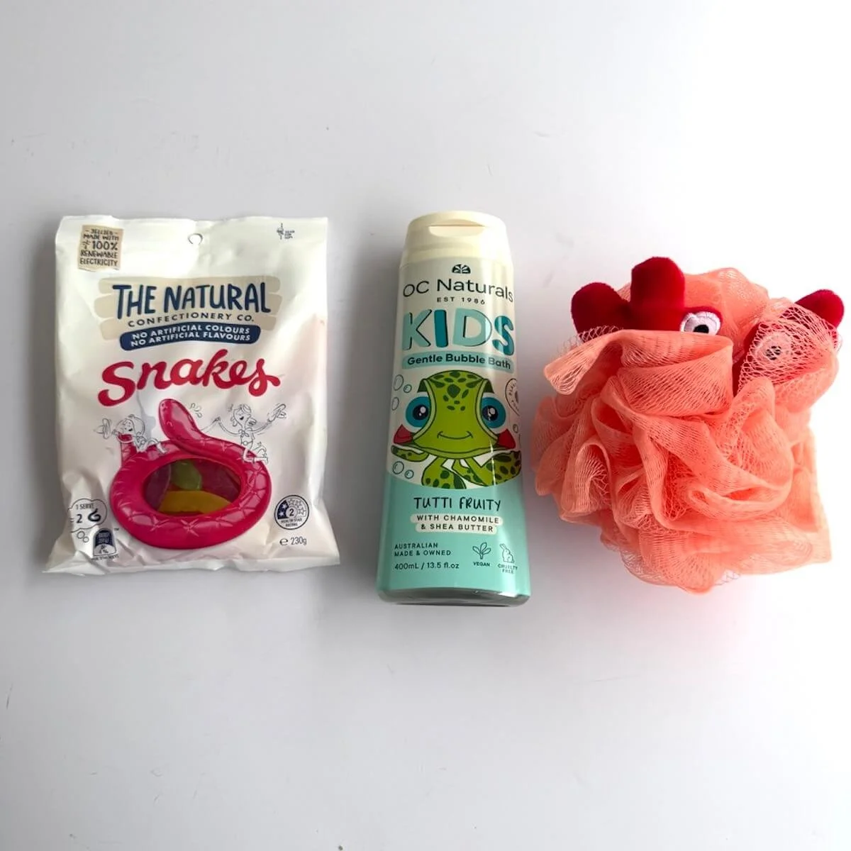 OC Naturals Kids Gentle Bubble Bath with crab-themed body washer and snake lollies gift set