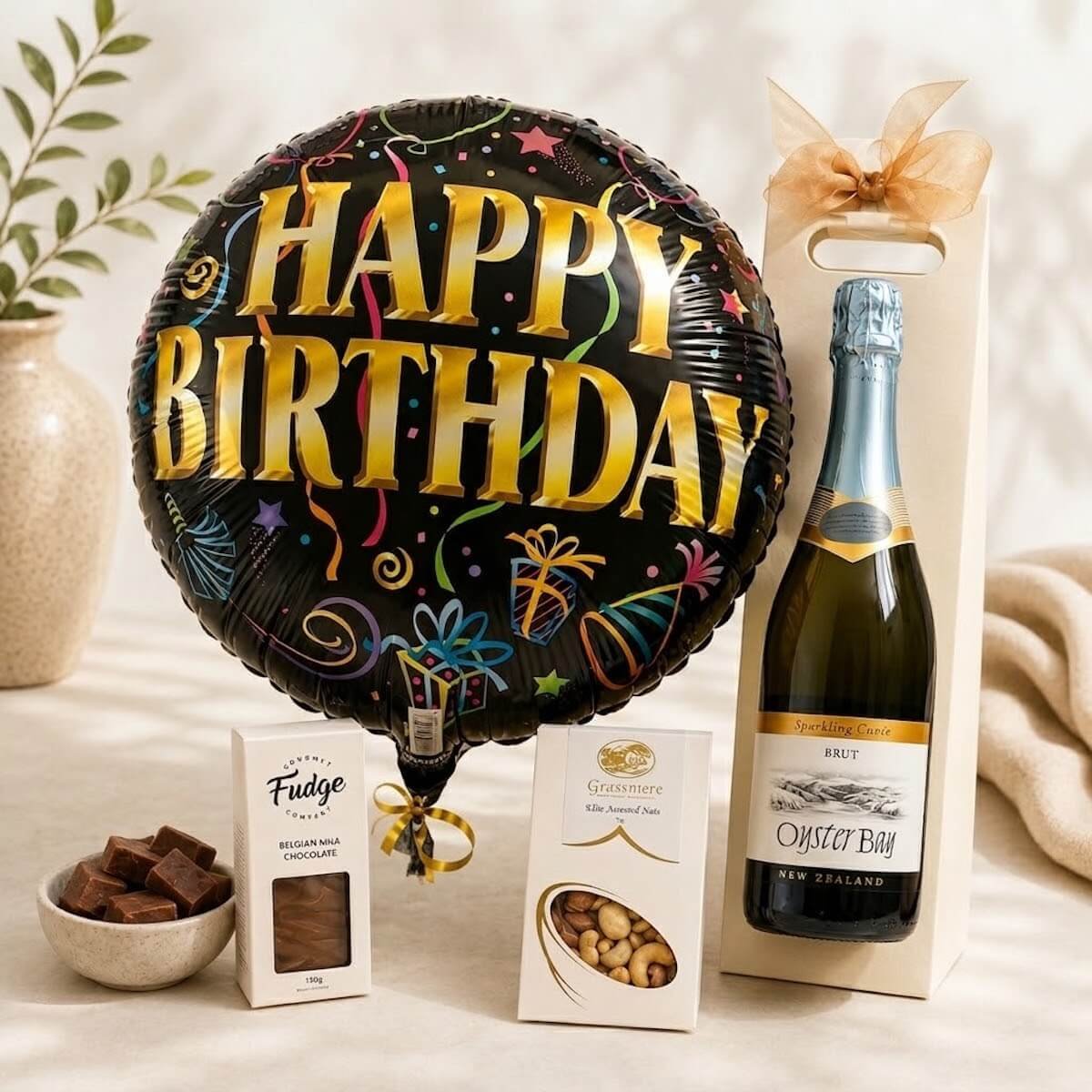 Celebration Bubbles Gift with champagne, gourmet treats, and helium balloon, available for same-day delivery on the Gold Coast.